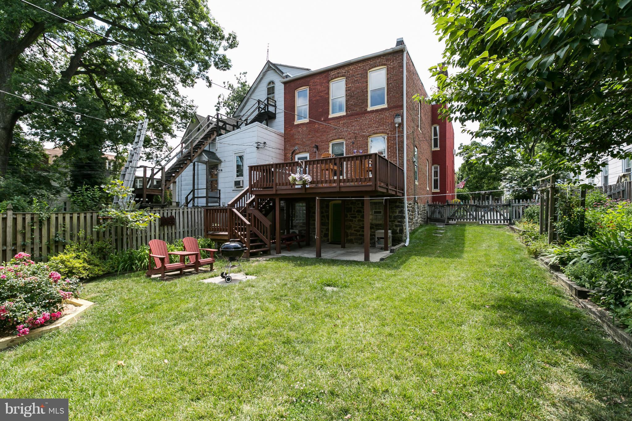 4015 Roland Avenue Baltimore, MD 21211 - Photo 28 of 30 a view of a house with a yard and sitting area