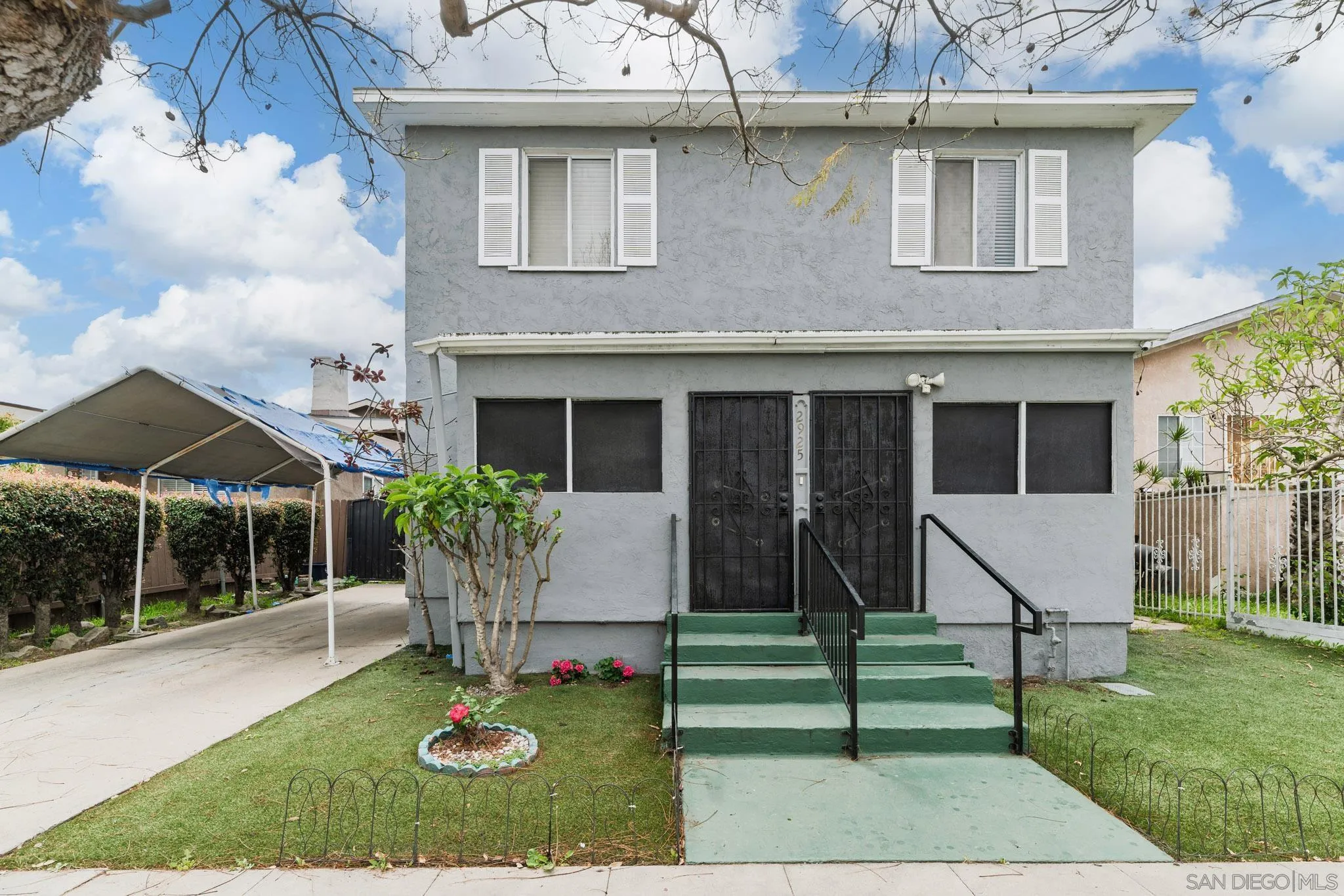 2925 Franklin Avenue San Diego, CA 92113 - Photo 2 of 36 a view of house with a yard and sitting area