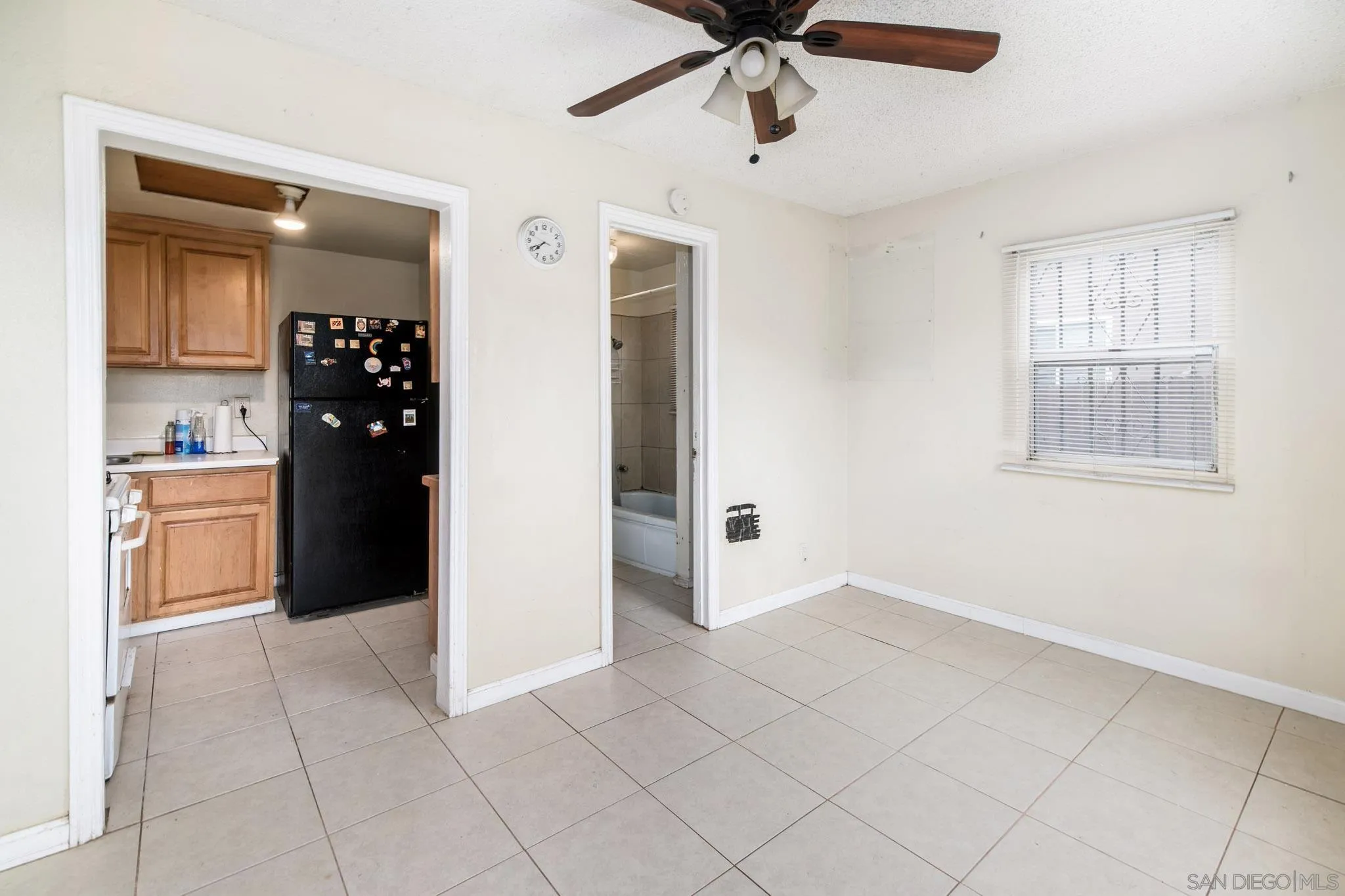 2925 Franklin Avenue San Diego, CA 92113 - Photo 25 of 36 a view of a kitchen with a sink and cabinets