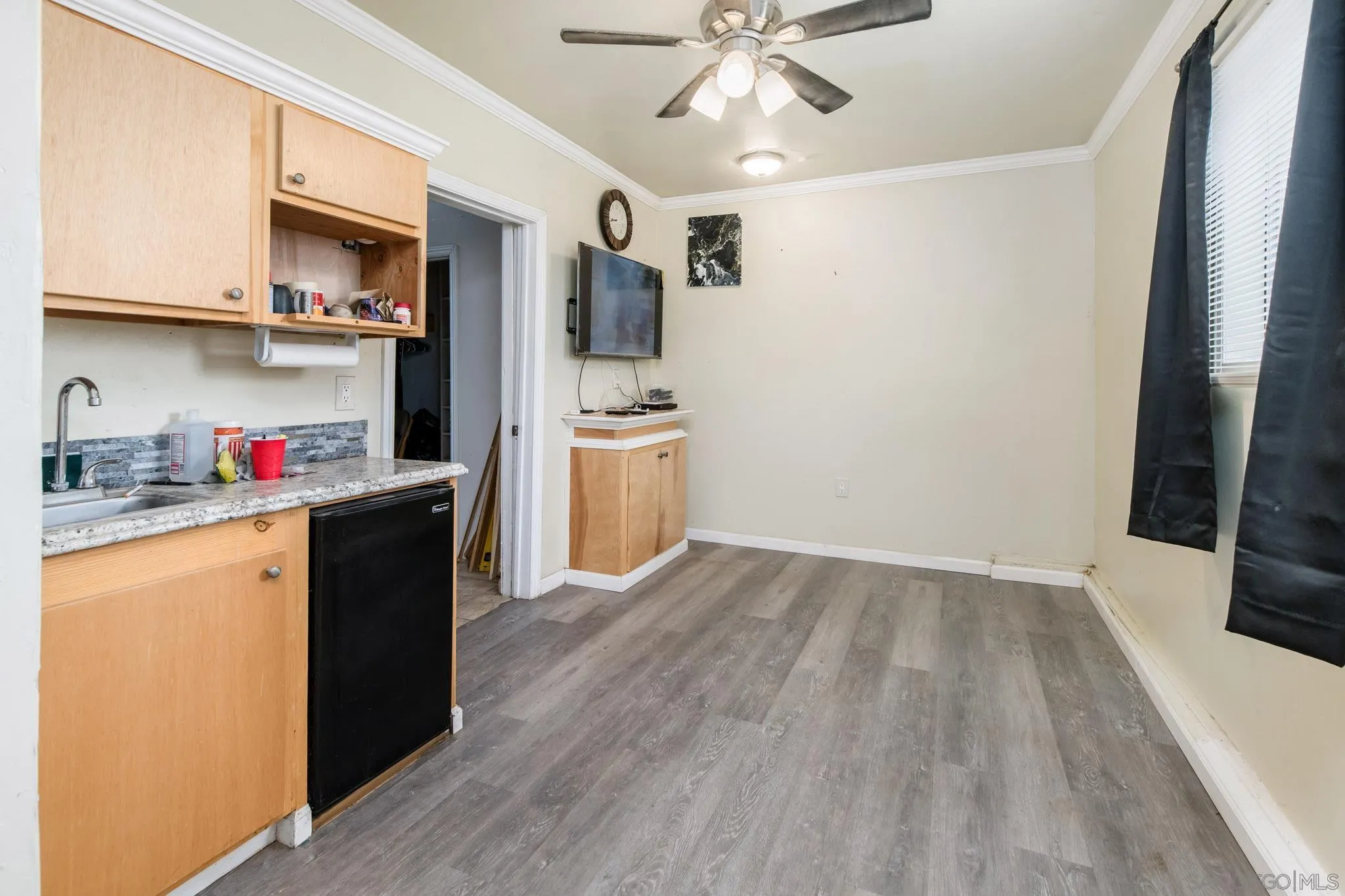 2925 Franklin Avenue San Diego, CA 92113 - Photo 32 of 36 a kitchen with stainless steel appliances granite countertop a refrigerator and a stove top oven
