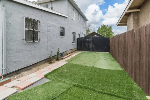 a view of a back yard of the house