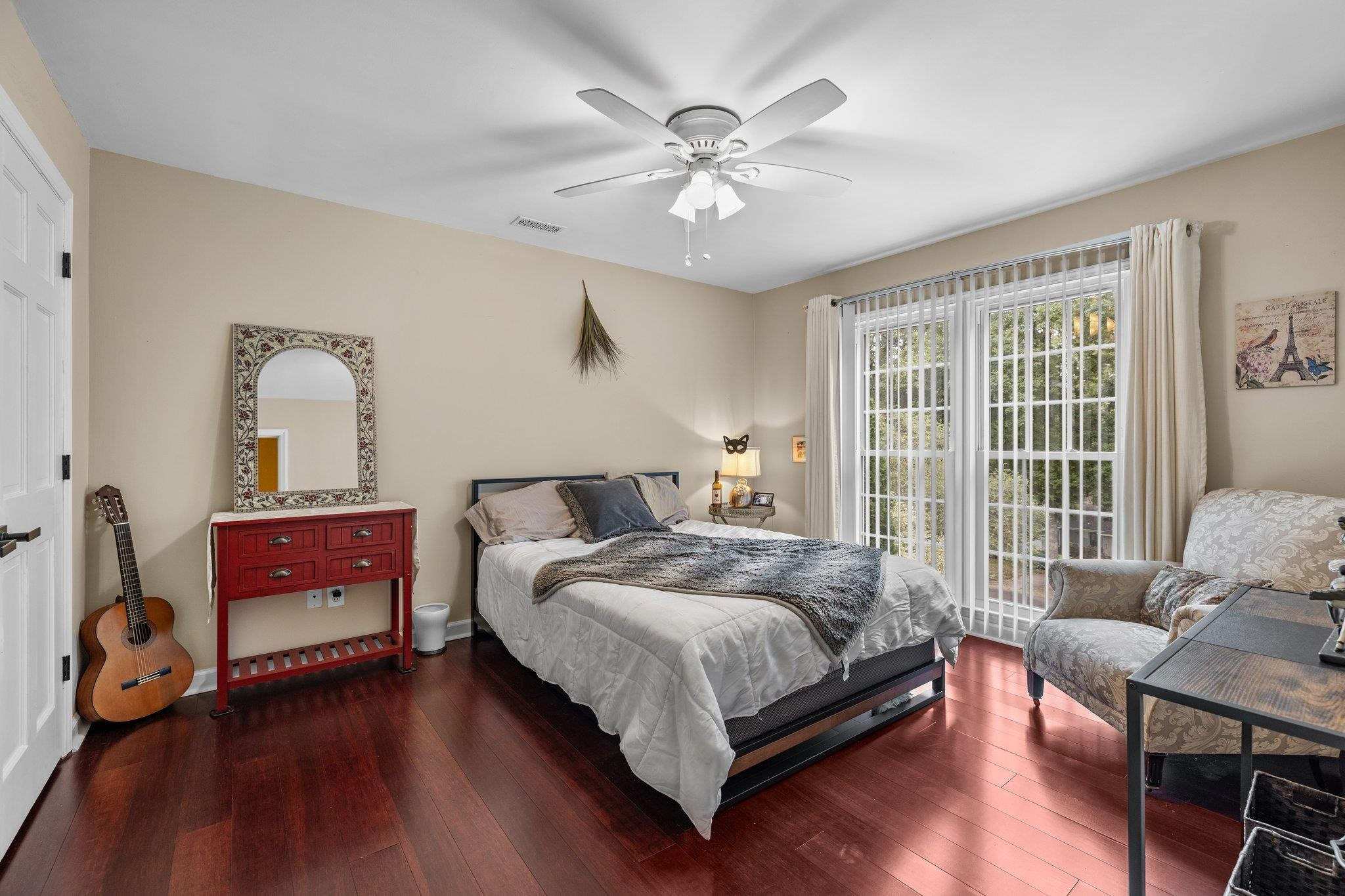 6305 Rushingbrook Drive Raleigh, NC 27612 - Photo 31 of 48 a bedroom with a bed and a couch