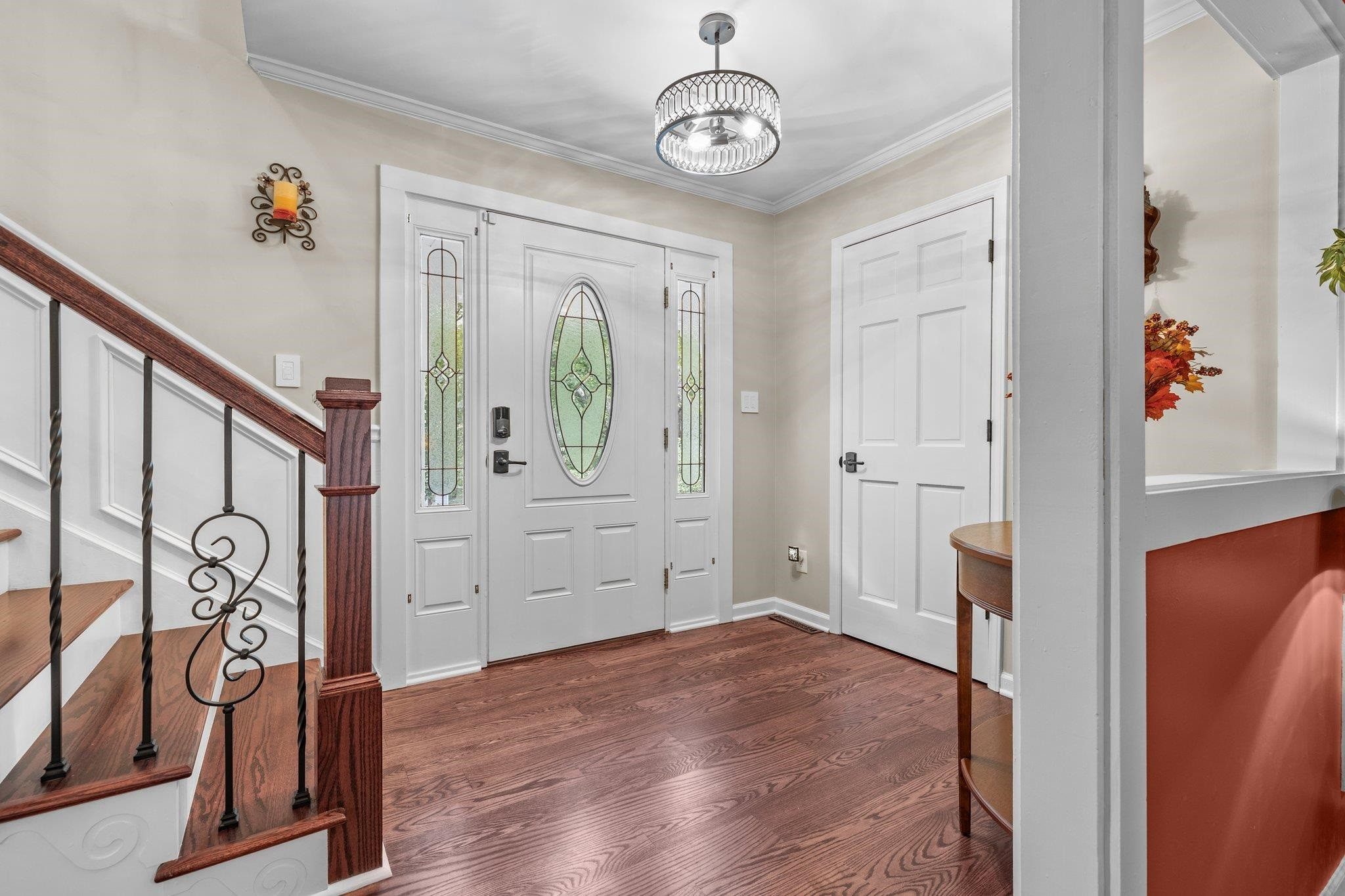 6305 Rushingbrook Drive Raleigh, NC 27612 - Photo 5 of 48 a view of an entryway with wooden floor