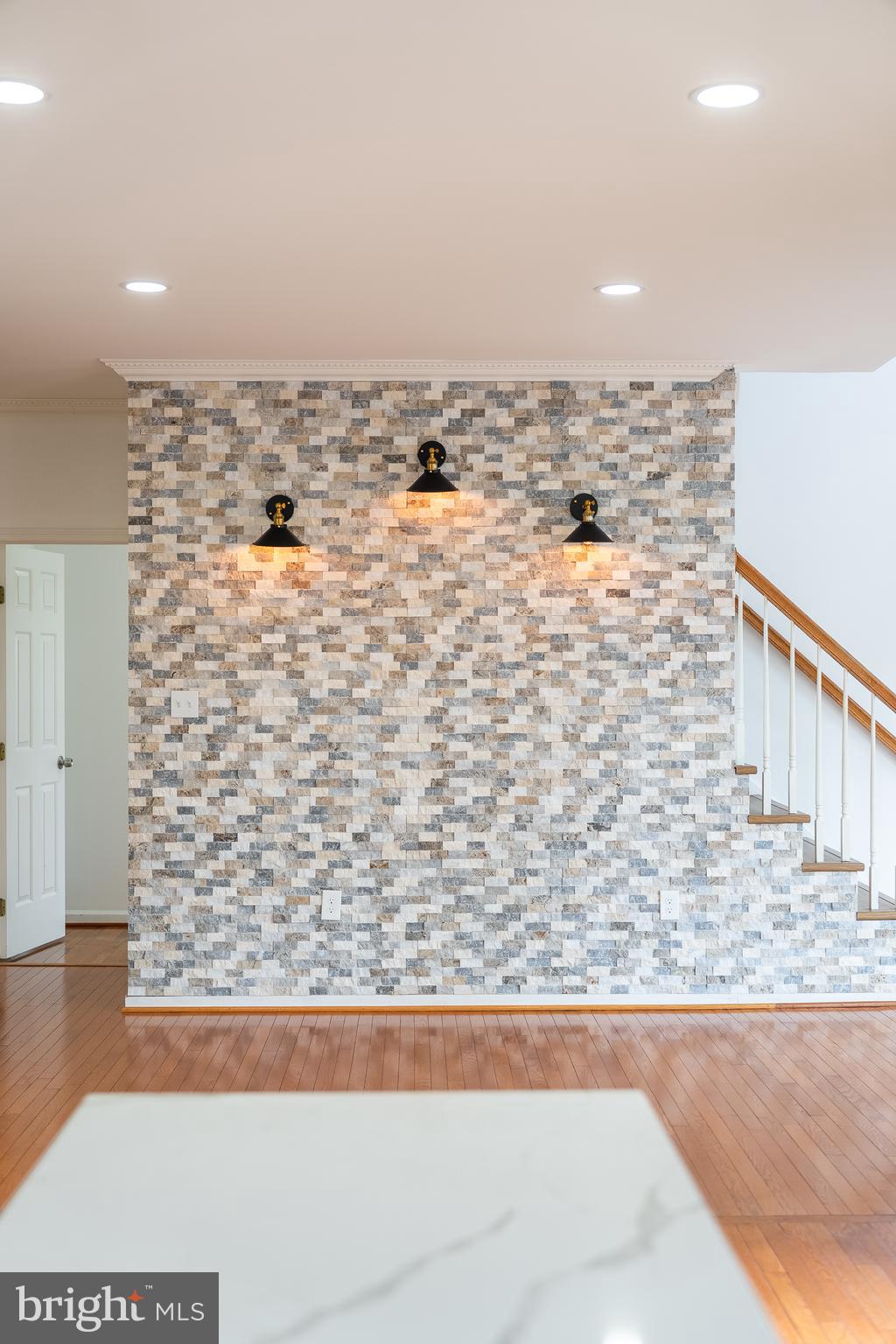 42827 Spinks Ferry Road Leesburg, VA 20176 - Photo 18 of 71 lighted stone accent wall in kitchen area