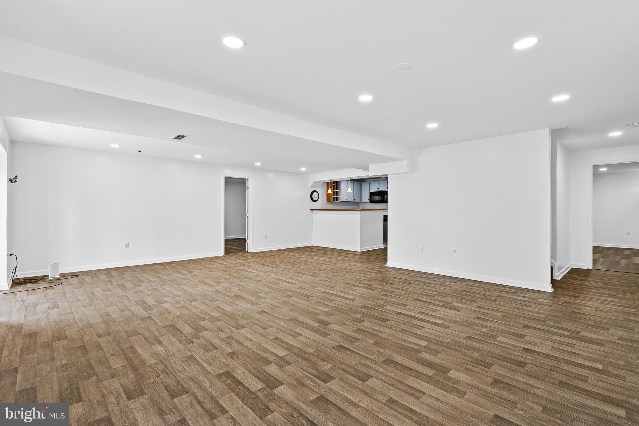 42827 Spinks Ferry Road Leesburg, VA 20176 - Photo 46 of 71 a view of empty room with wooden floor