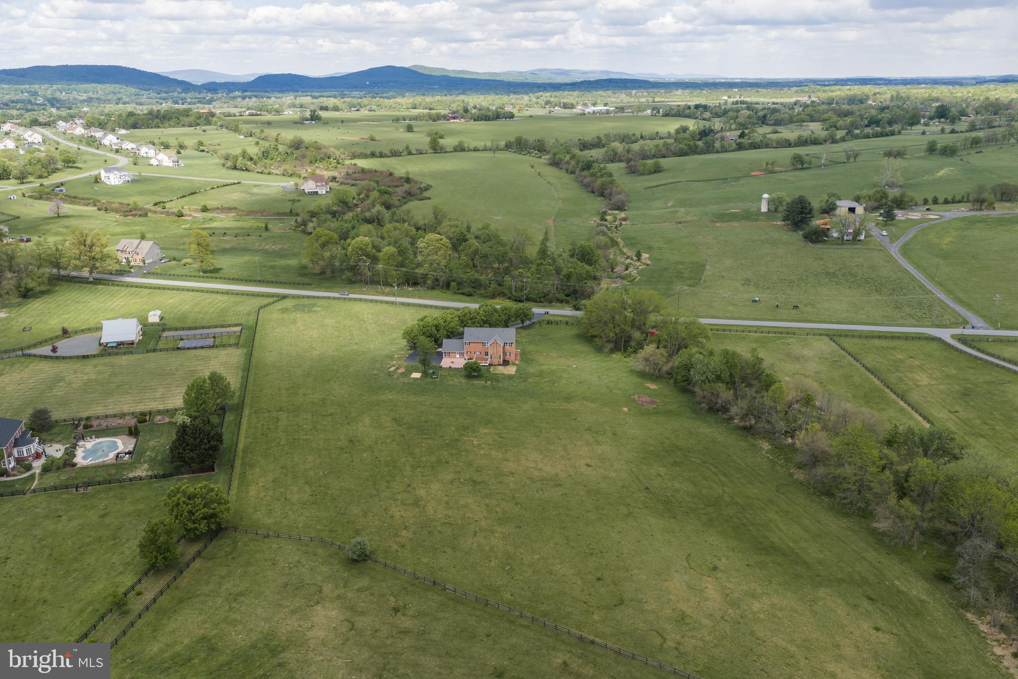 42827 Spinks Ferry Road Leesburg, VA 20176 - Photo 62 of 71 a view of a lake with a mountain