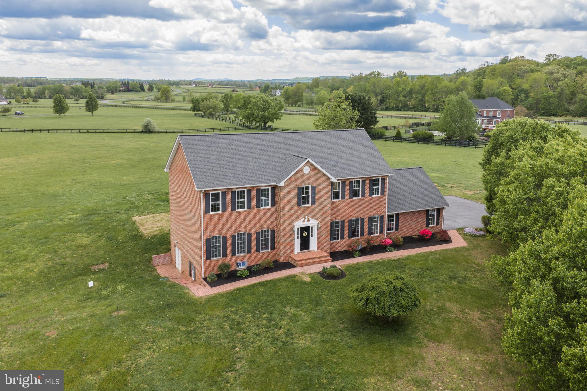 42827 Spinks Ferry Road Leesburg, VA 20176 - Photo 68 of 71 an aerial view of a house with a big yard