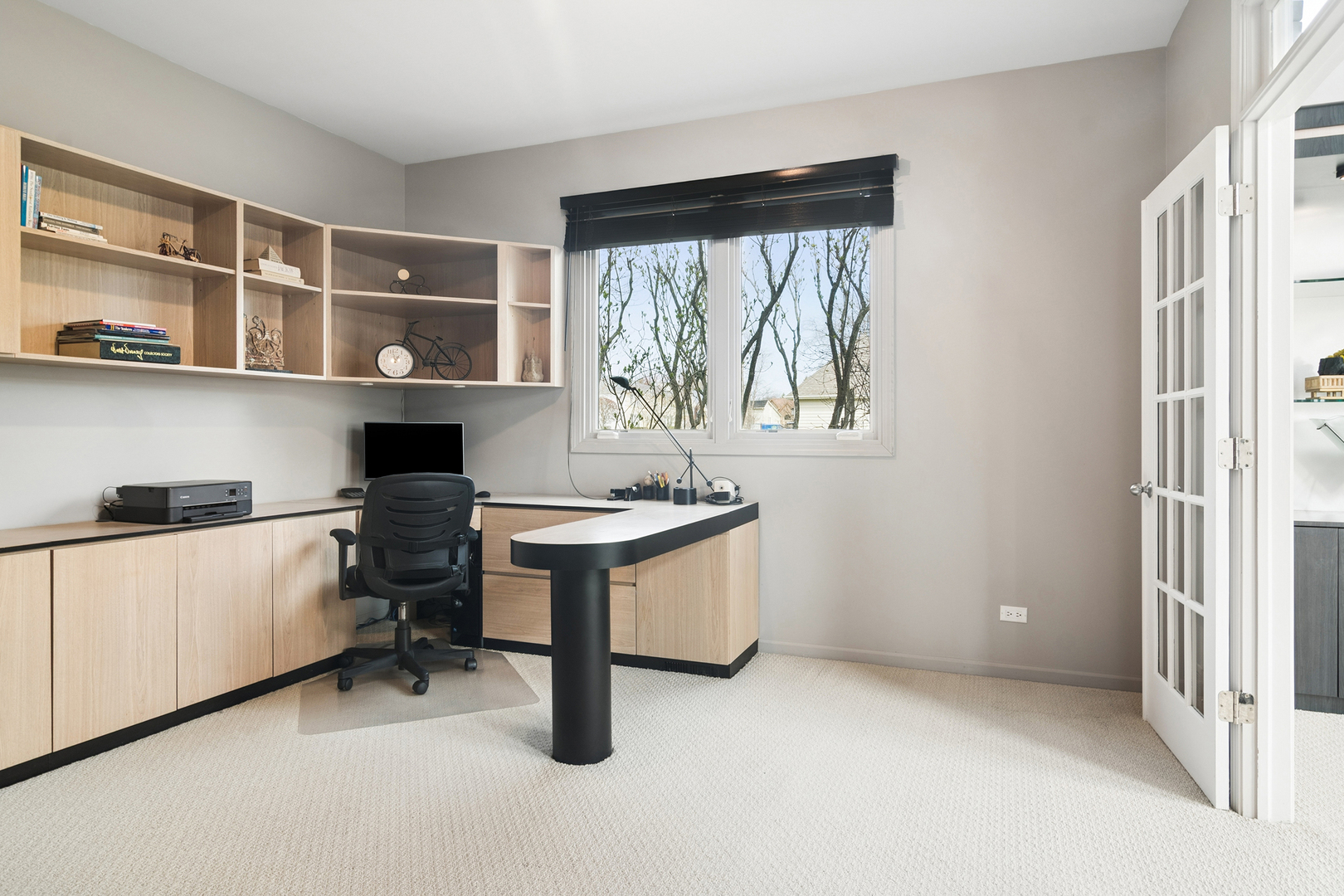 2038 Sheridan Road Buffalo Grove, IL 60089 - Photo 14 of 44 a view of workspace with a window and cabinet