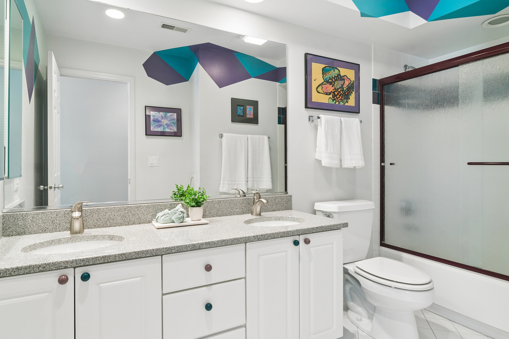 2038 Sheridan Road Buffalo Grove, IL 60089 - Photo 25 of 44 a bathroom with a granite countertop sink mirror vanity and toilet