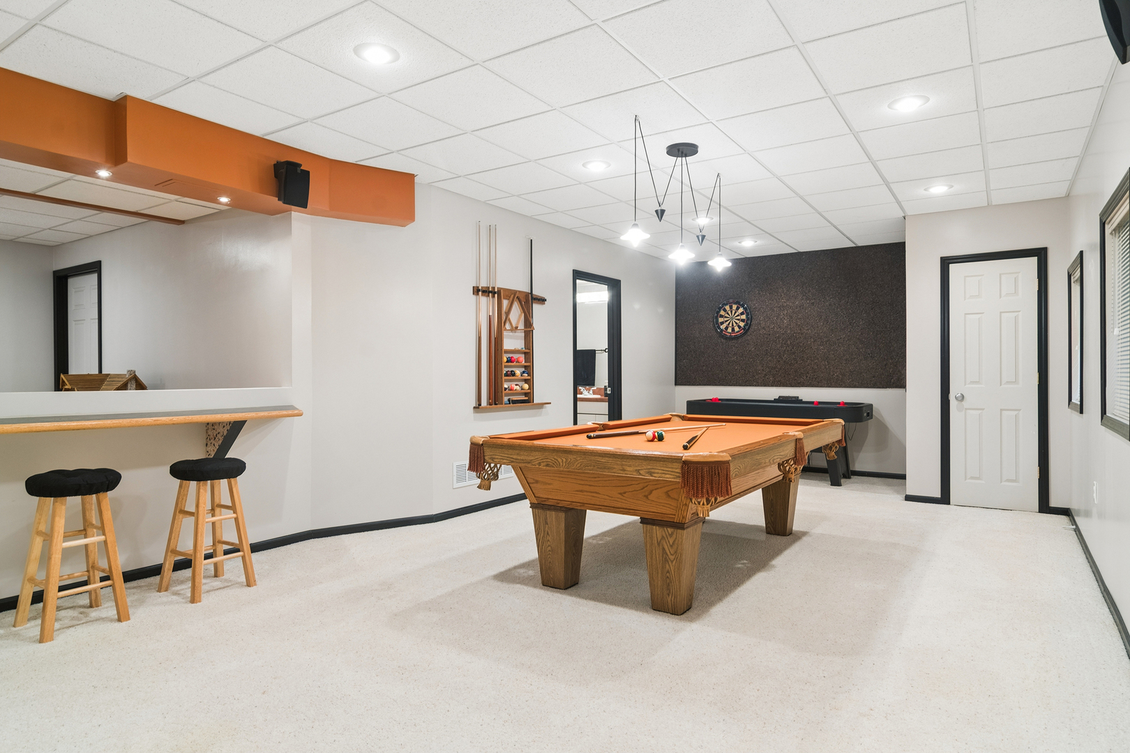 2038 Sheridan Road Buffalo Grove, IL 60089 - Photo 29 of 44 a spacious bathroom with a table a sink and a mirror