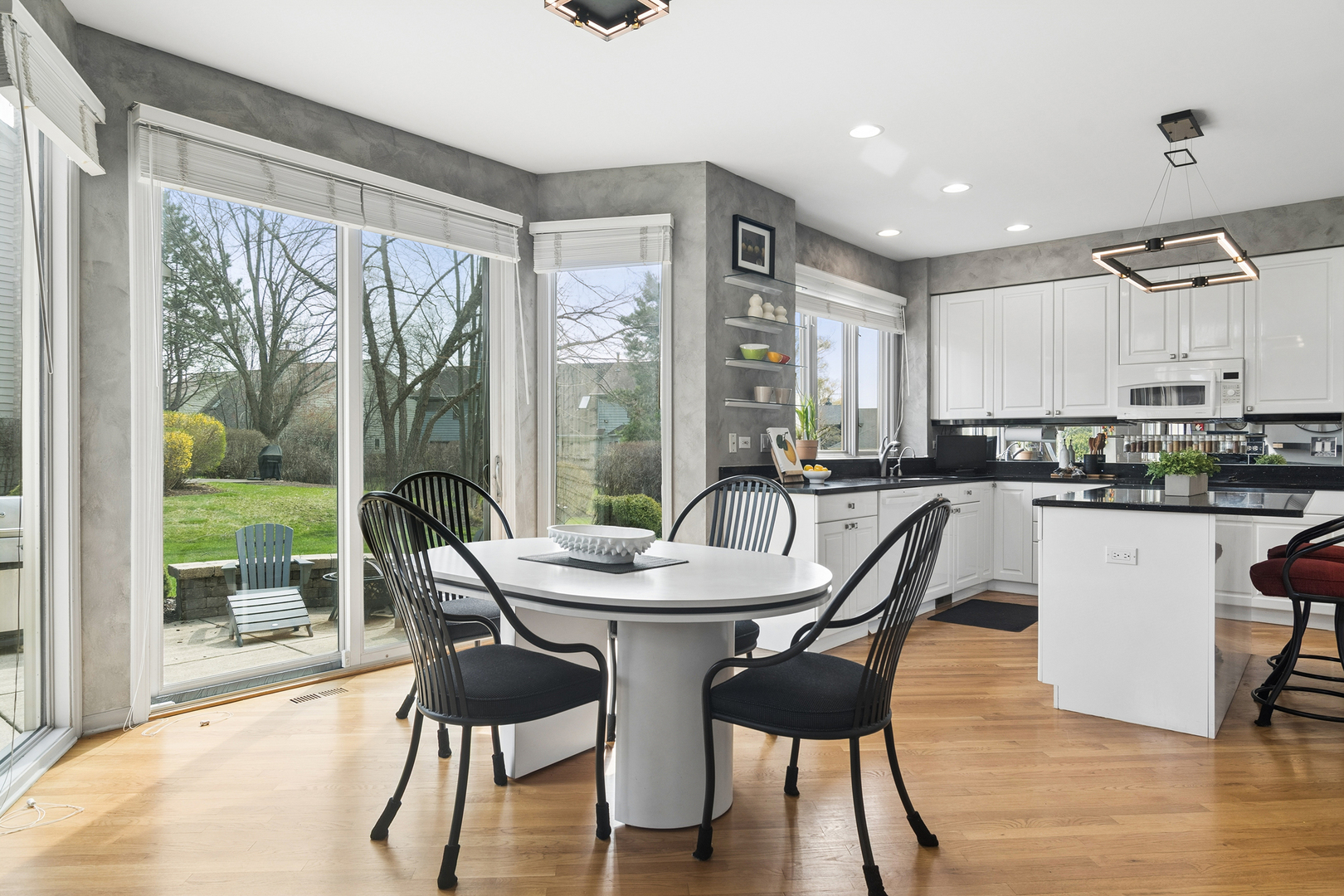 2038 Sheridan Road Buffalo Grove, IL 60089 - Photo 10 of 44 a view of a dining room with furniture window and wooden floor