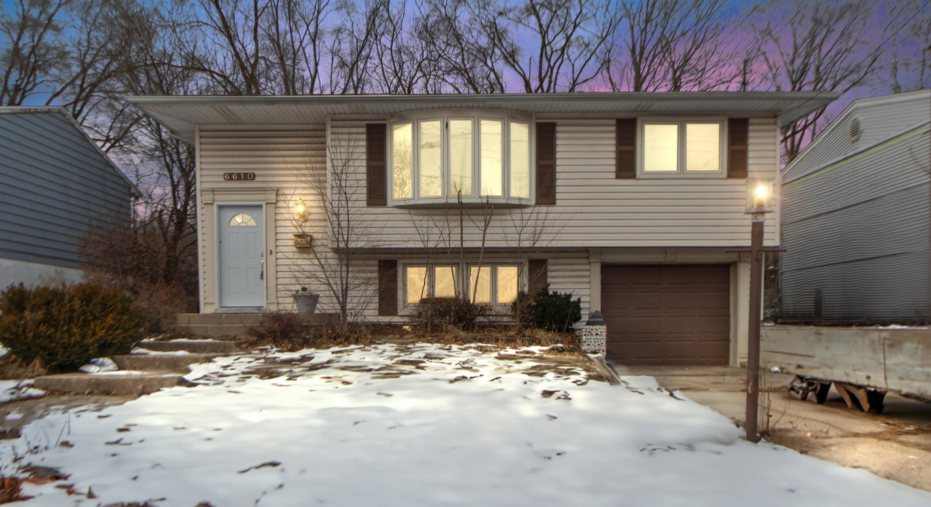 6610 East 3rd Avenue Gary, IN 46403 - Photo 1 of 24 a front view of a house