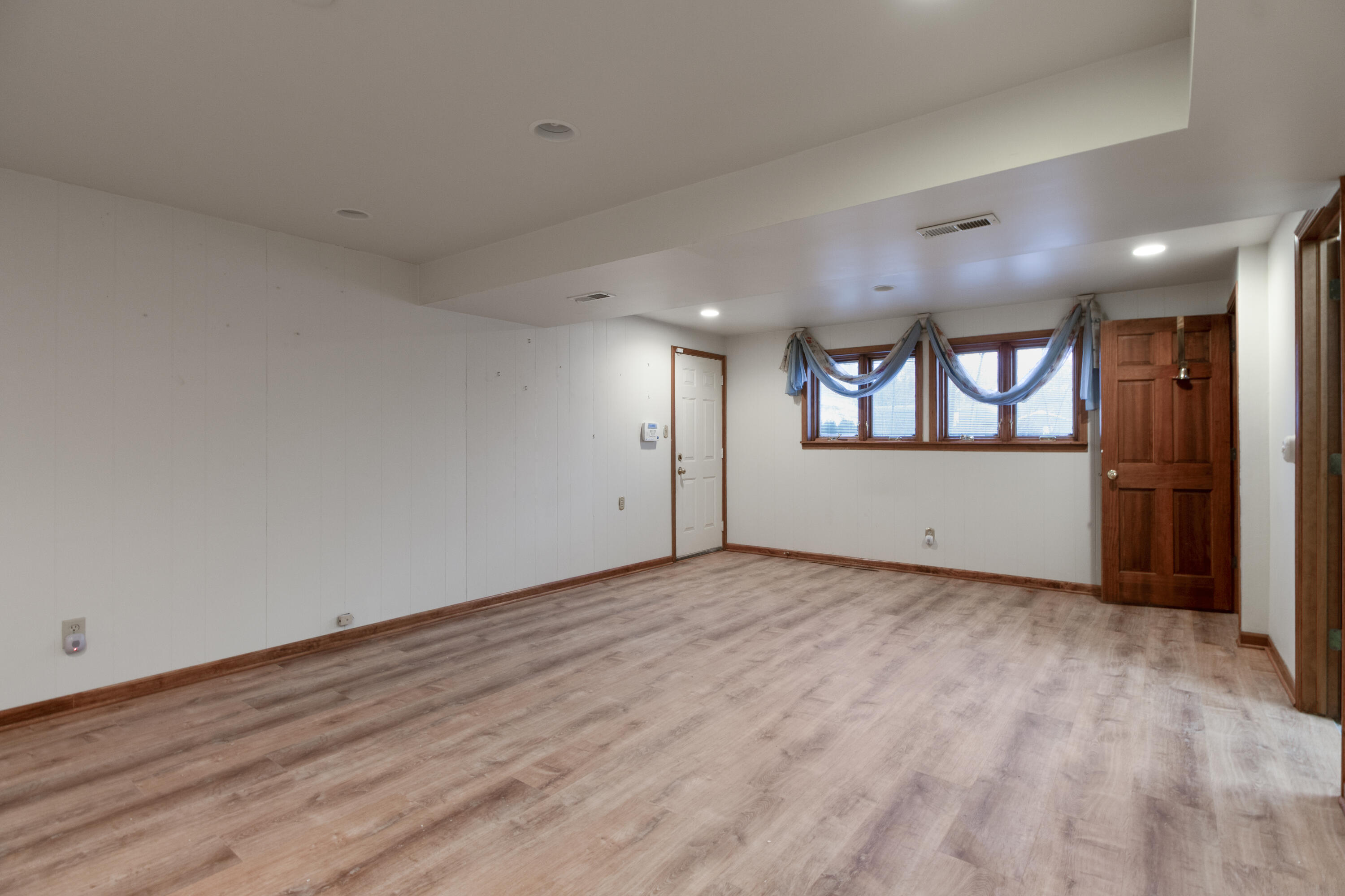6610 East 3rd Avenue Gary, IN 46403 - Photo 17 of 24 wooden floor in an empty room