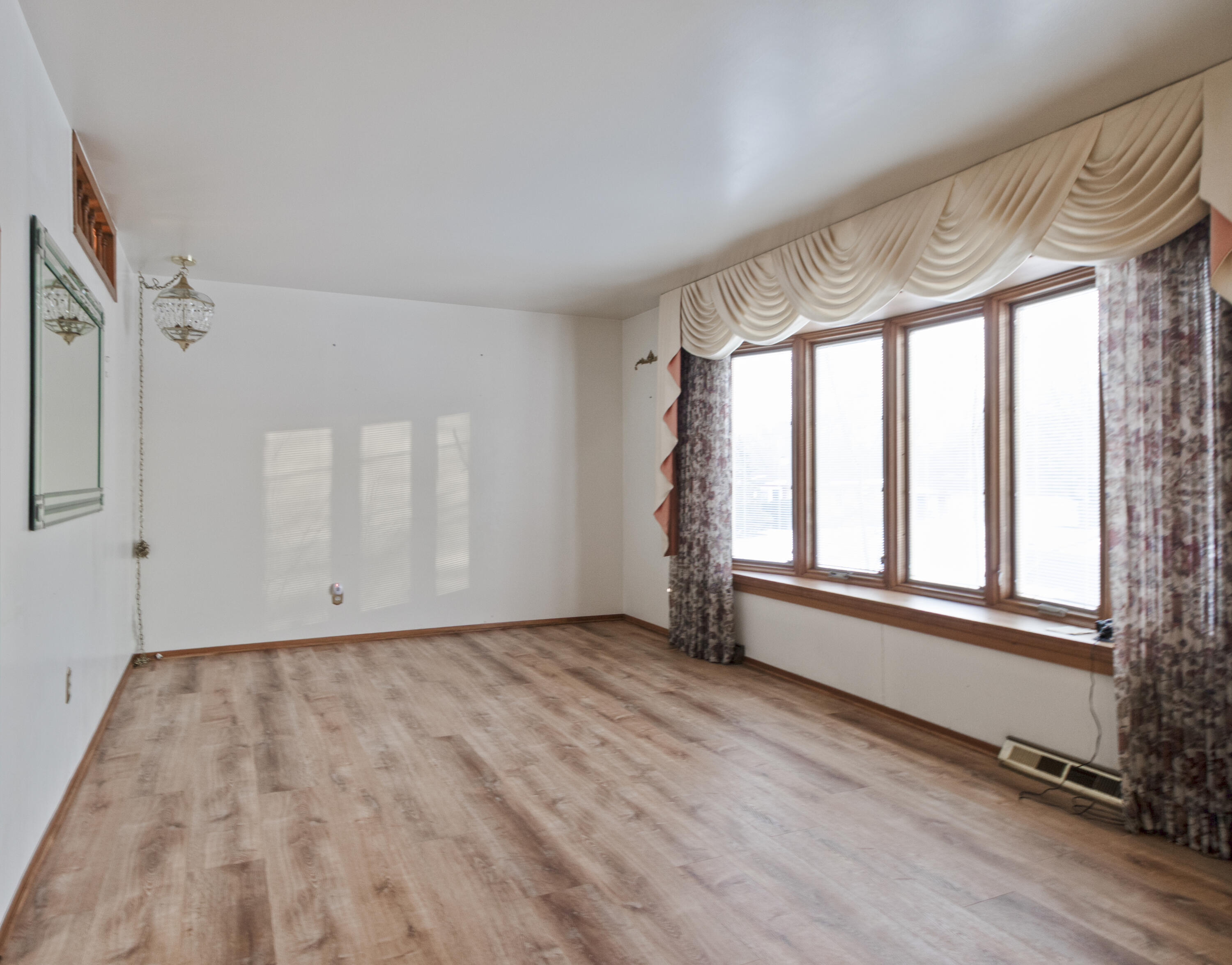 6610 East 3rd Avenue Gary, IN 46403 - Photo 3 of 24 a view of an empty room with a window