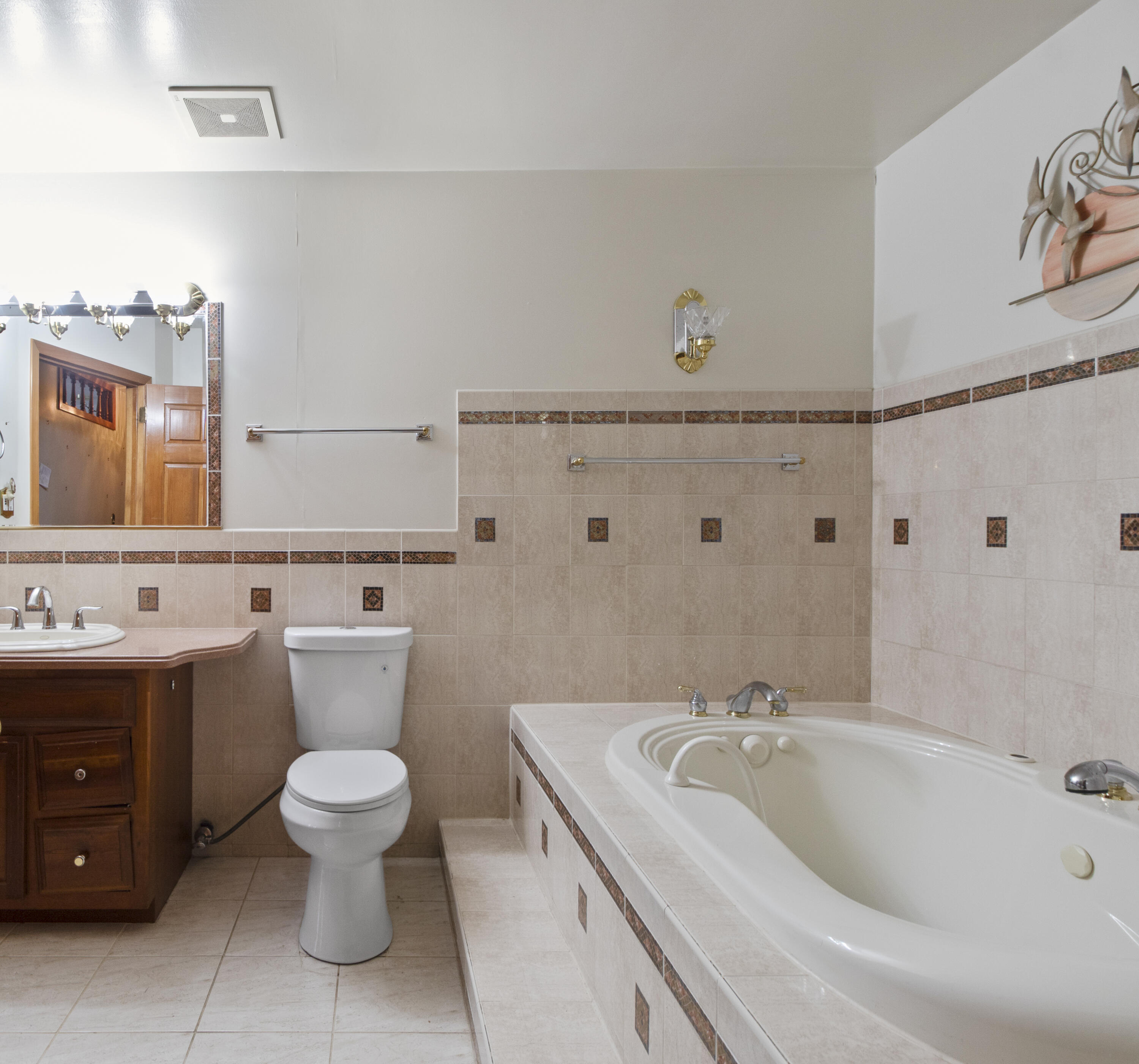 6610 East 3rd Avenue Gary, IN 46403 - Photo 9 of 24 a bathroom with a sink and a toilet