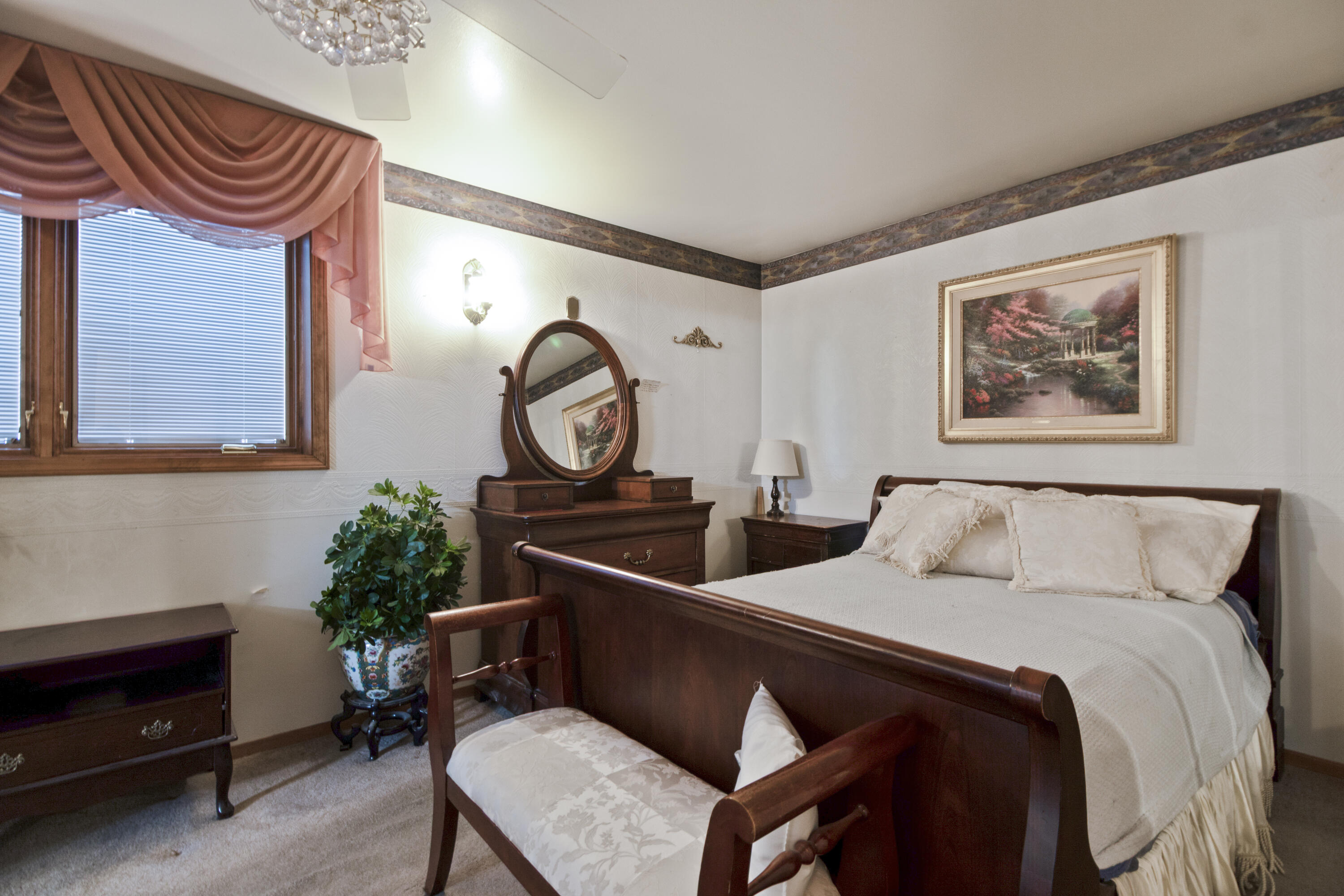 6610 East 3rd Avenue Gary, IN 46403 - Photo 10 of 24 a bedroom with furniture and a mirror