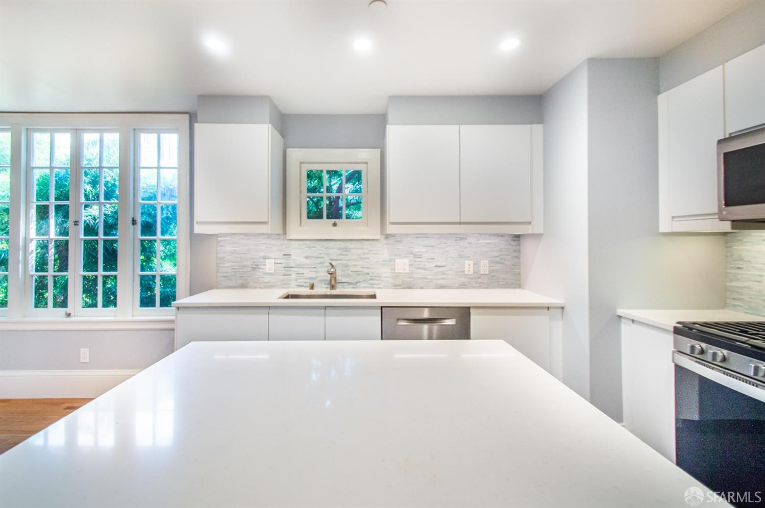 2740 Union Street San Francisco, CA 94123 - Photo 16 of 87 a spacious bathroom with stainless steel appliances granite countertop a sink and a white cabinets