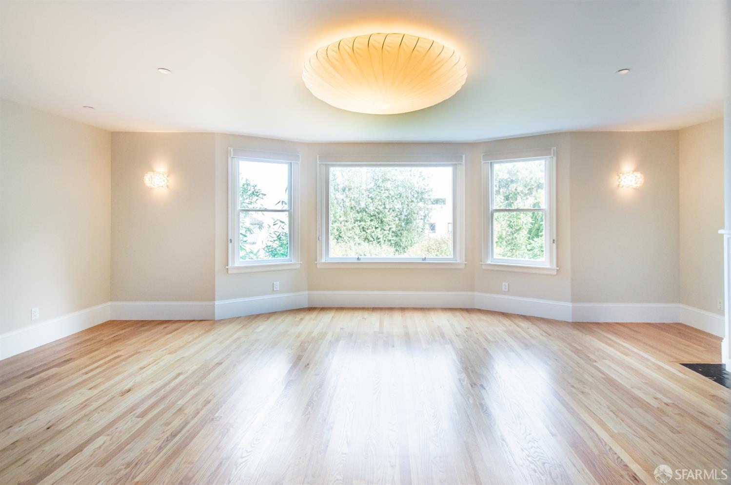 2740 Union Street San Francisco, CA 94123 - Photo 19 of 87 an empty room with wooden floor and windows