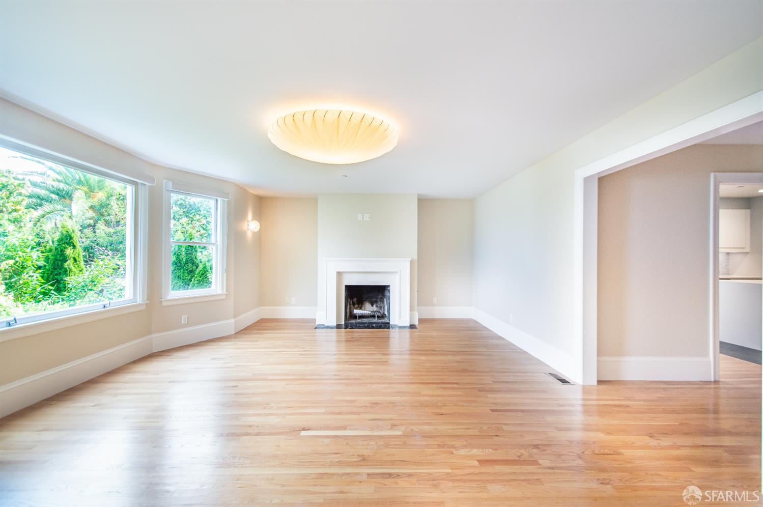 2740 Union Street San Francisco, CA 94123 - Photo 21 of 87 a view of an empty room with wooden floor and a window