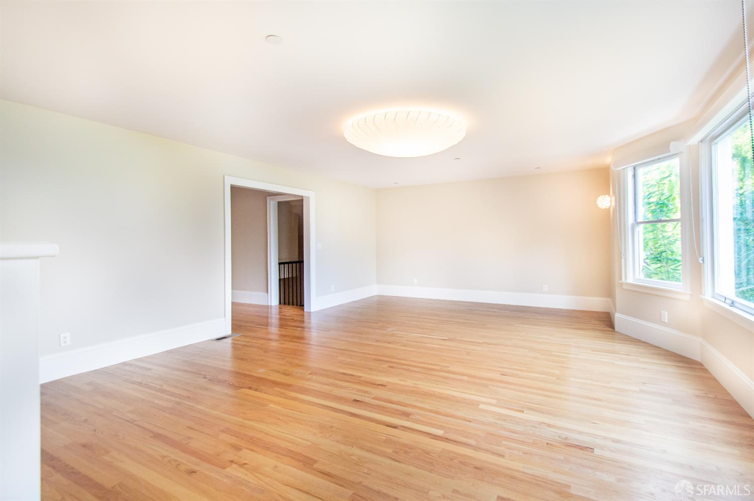 2740 Union Street San Francisco, CA 94123 - Photo 22 of 87 a view of an empty room with wooden floor and a window