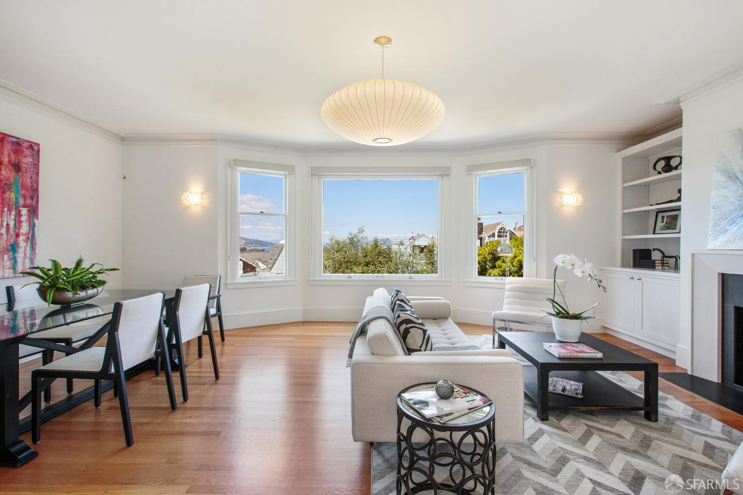 2740 Union Street San Francisco, CA 94123 - Photo 32 of 87 a living room with furniture a dining table and a large window