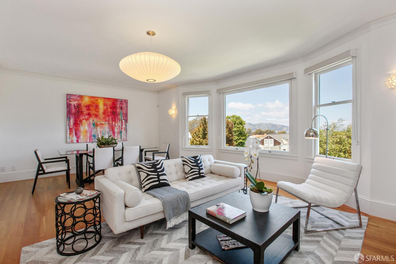 2740 Union Street San Francisco, CA 94123 - Photo 35 of 87 a living room with furniture a table and a large window