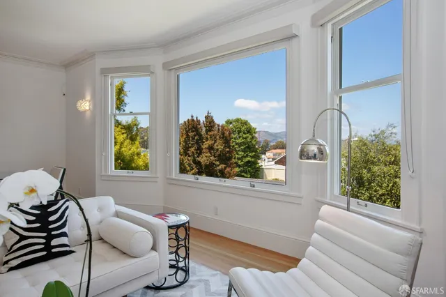 a bedroom with a bed and a cabinets