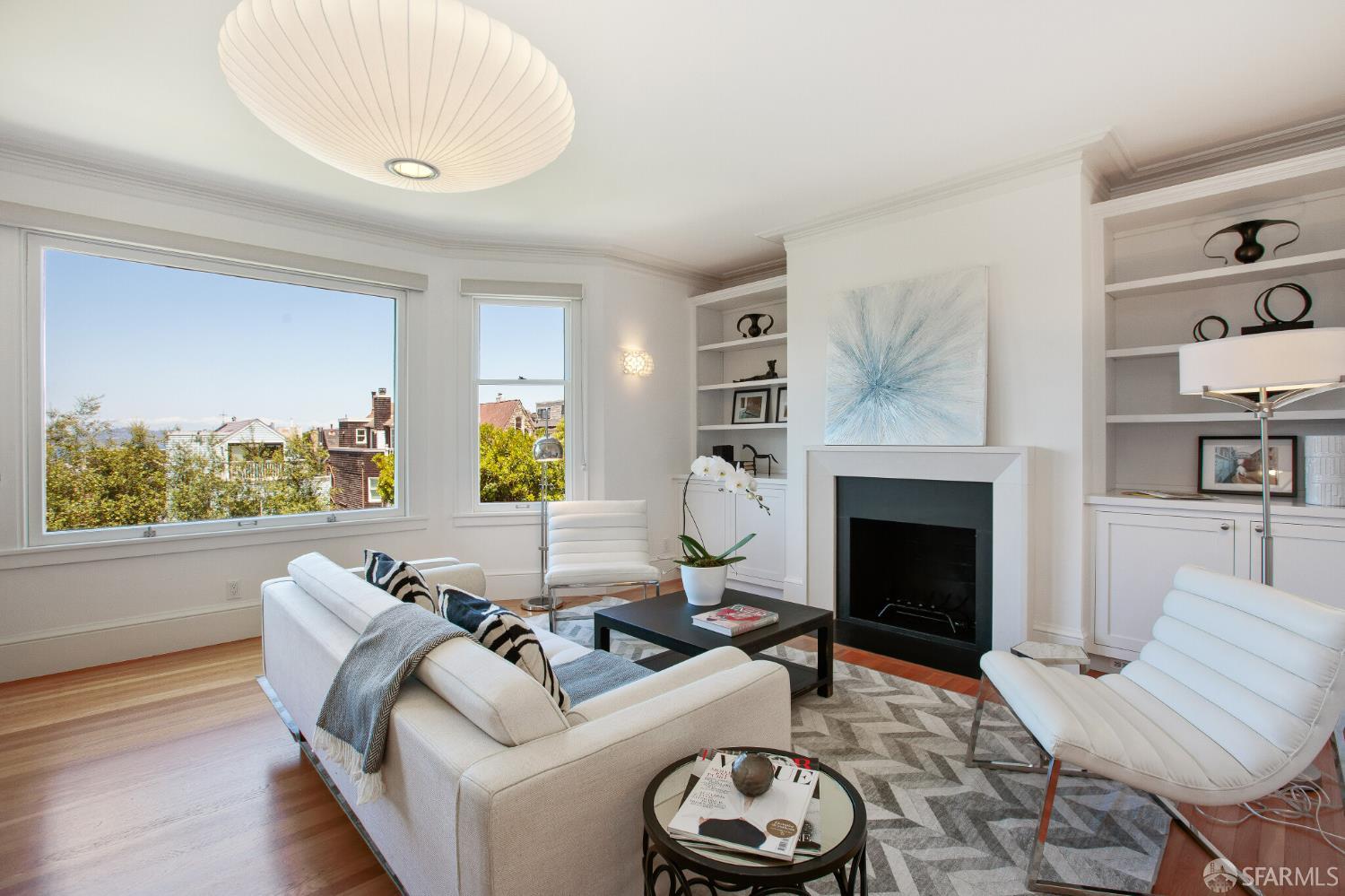 2740 Union Street San Francisco, CA 94123 - Photo 40 of 87 a living room with furniture a fireplace and a large window