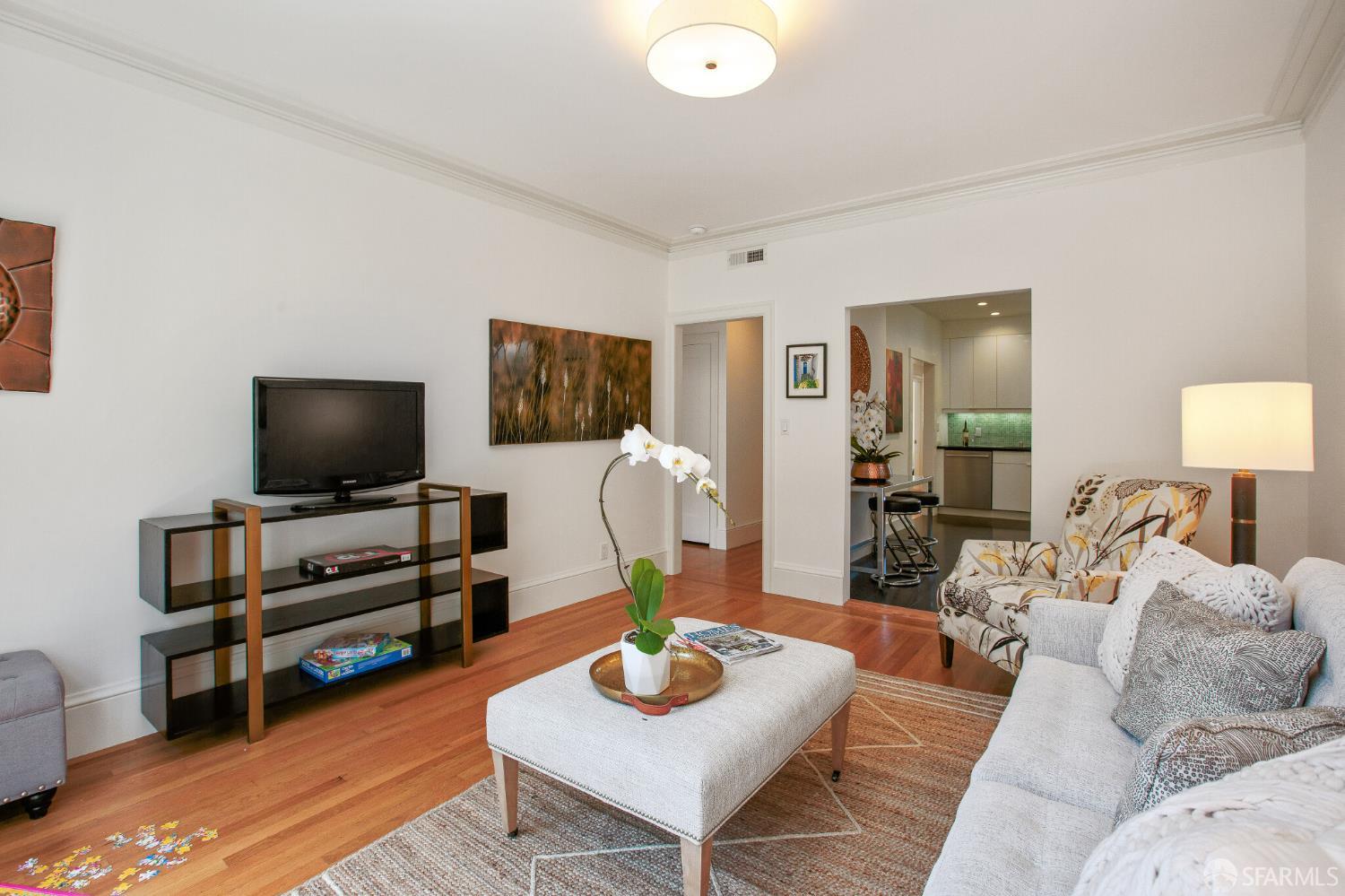 2740 Union Street San Francisco, CA 94123 - Photo 46 of 87 a living room with furniture and a flat screen tv