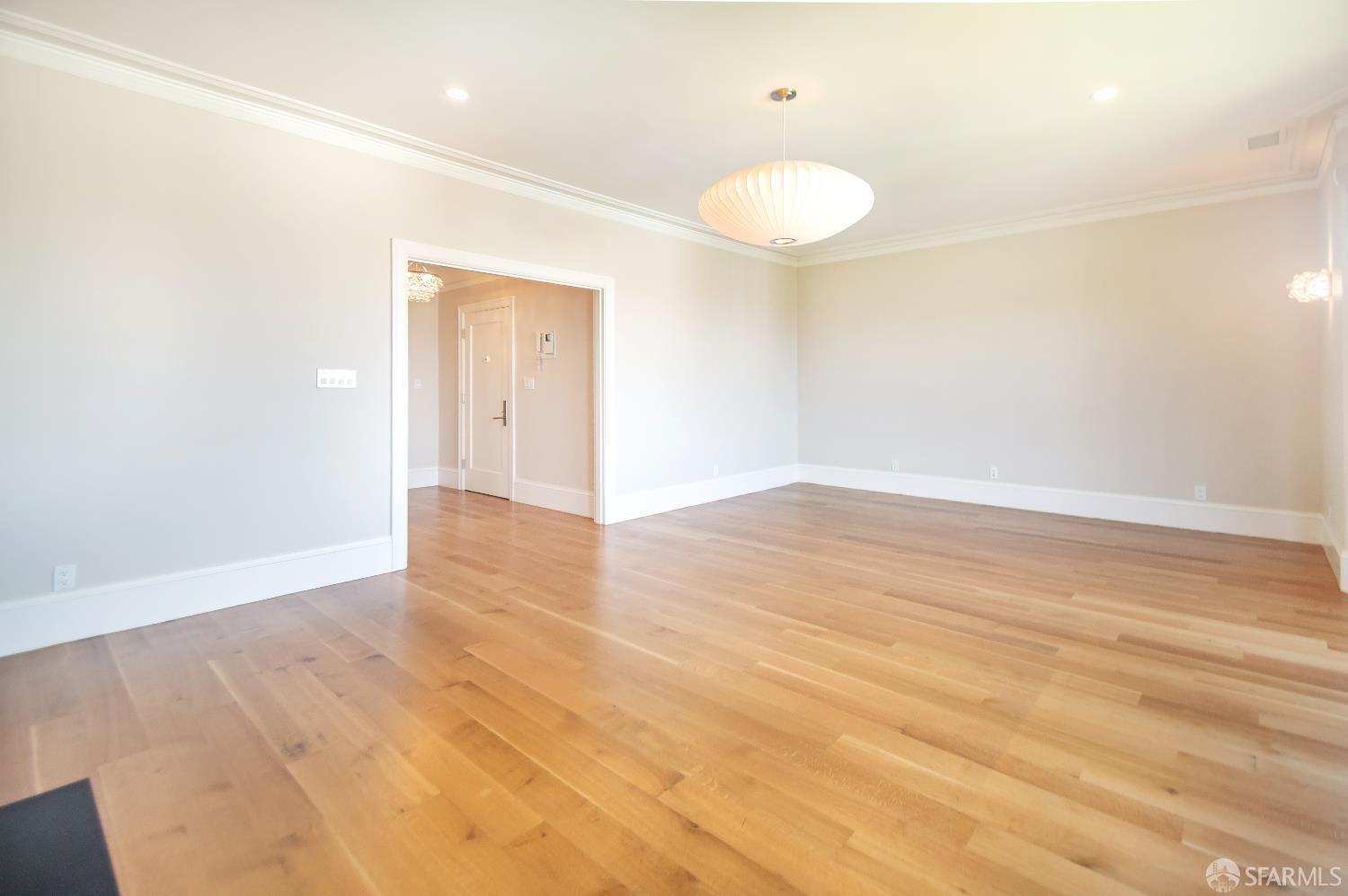 2740 Union Street San Francisco, CA 94123 - Photo 67 of 87 an empty room with wooden floor and windows