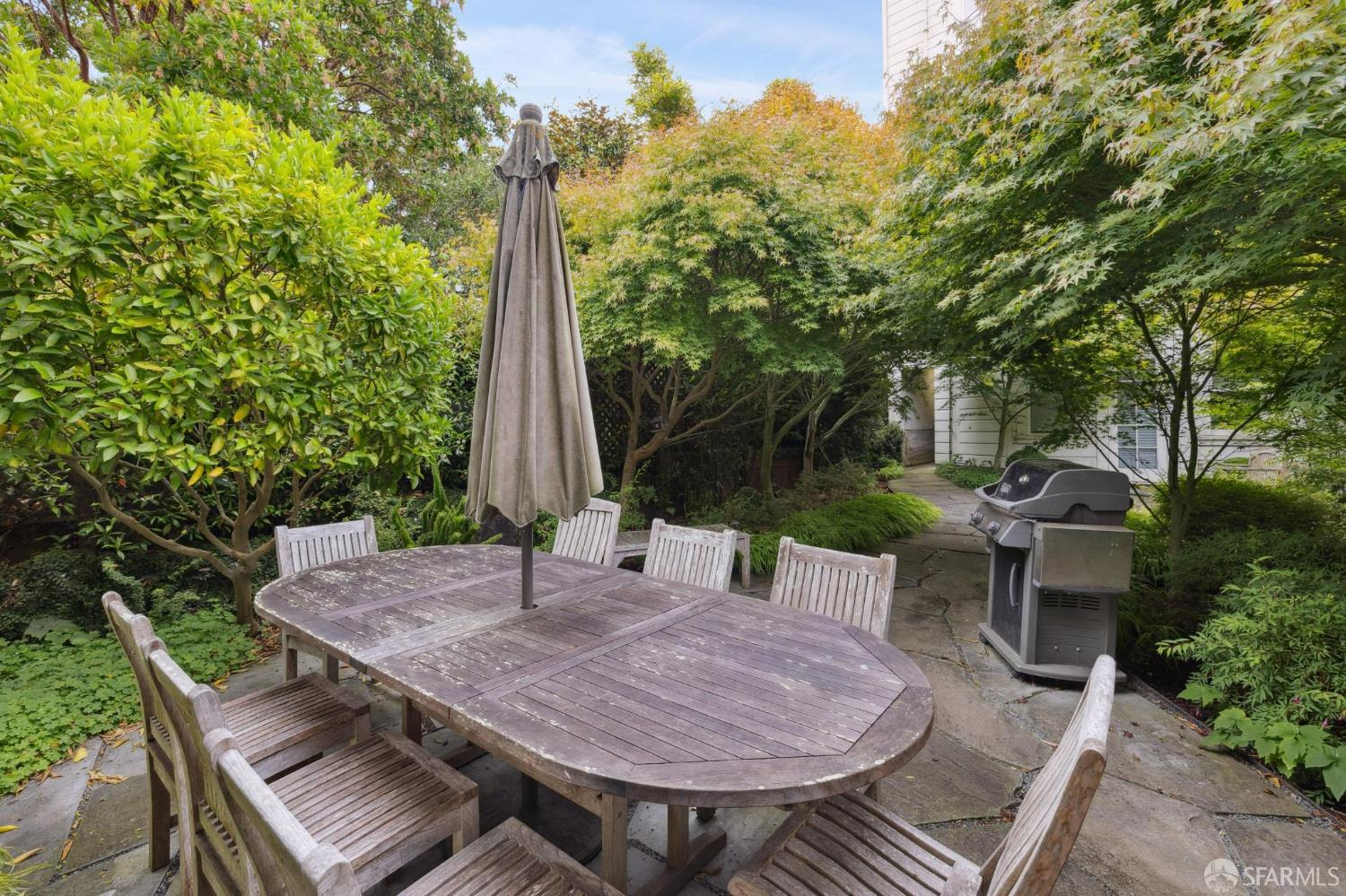 2740 Union Street San Francisco, CA 94123 - Photo 10 of 87 a view of a patio with table and chairs and potted plants