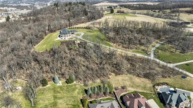 a view of a lake with a yard