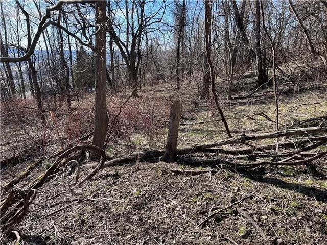 an aerial view of residential building with parking space