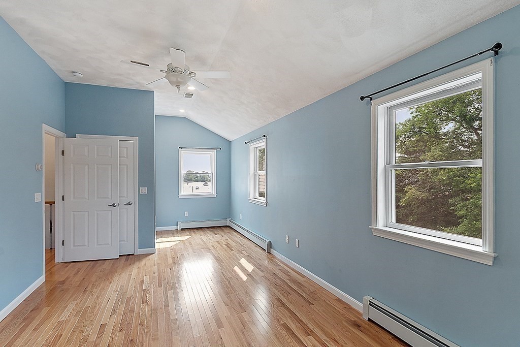 16 Choate Avenue Danvers, MA 01923 - Photo 17 of 32 a view of an empty room with wooden floor and a window