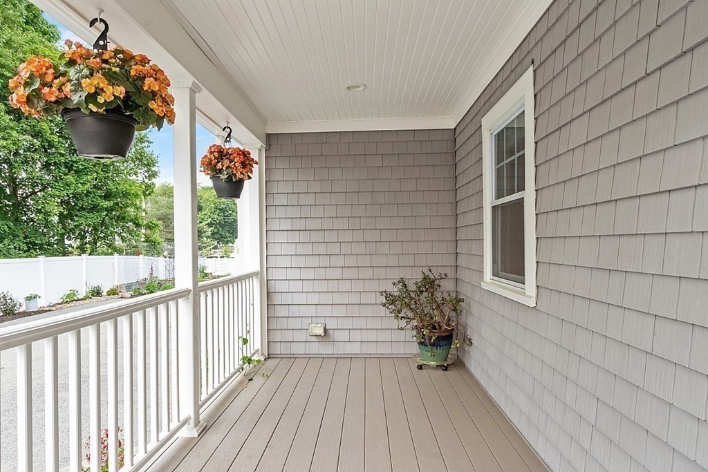 16 Choate Avenue Danvers, MA 01923 - Photo 25 of 32 a view of a porch with wooden floor