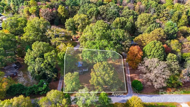 an aerial view of houses with yard