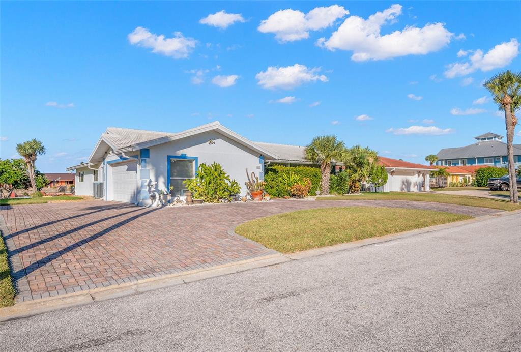 5451 Windward Way New Port Richey, FL 34652 - Photo 5 of 36 a view of a house with basketball court
