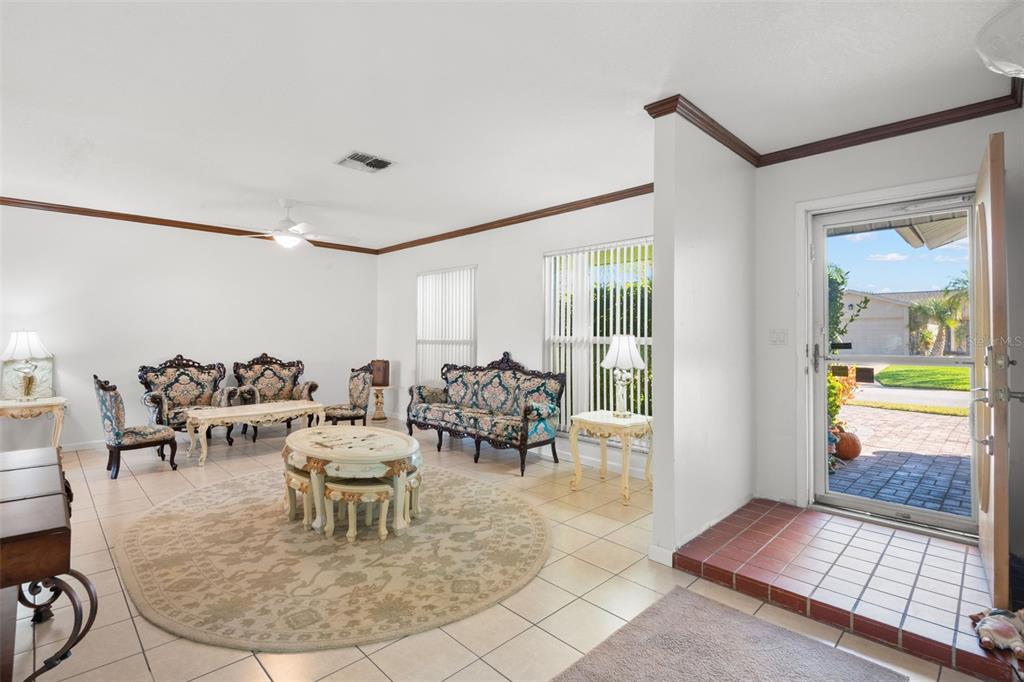 5451 Windward Way New Port Richey, FL 34652 - Photo 6 of 36 a living room with furniture and a window