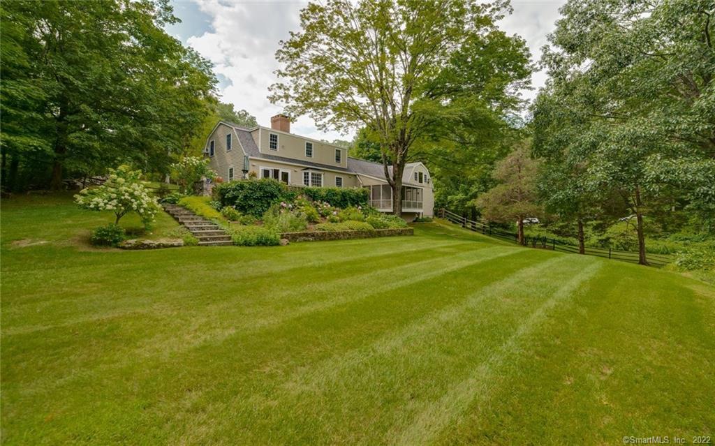 43 Jericho Road North Sherman, CT 06784 - Photo 1 of 1 a view of an apartment house with a yard