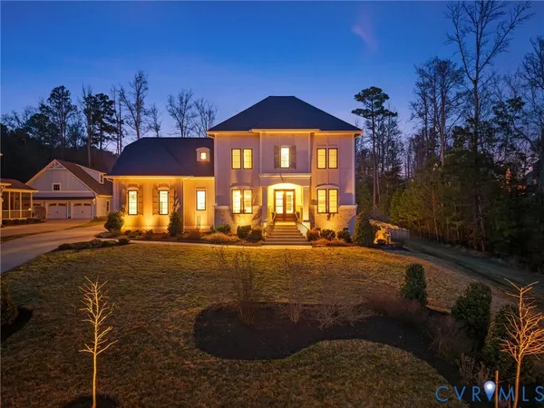 a front view of a house with yard