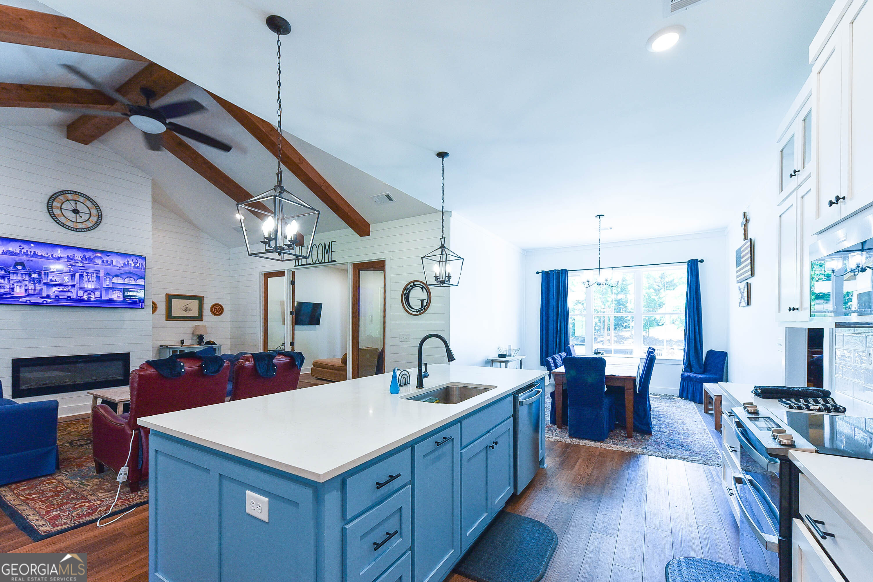 209 Lee Road Salem, AL 36874 - Photo 10 of 37 a large kitchen with sink a counter space and stainless steel appliances