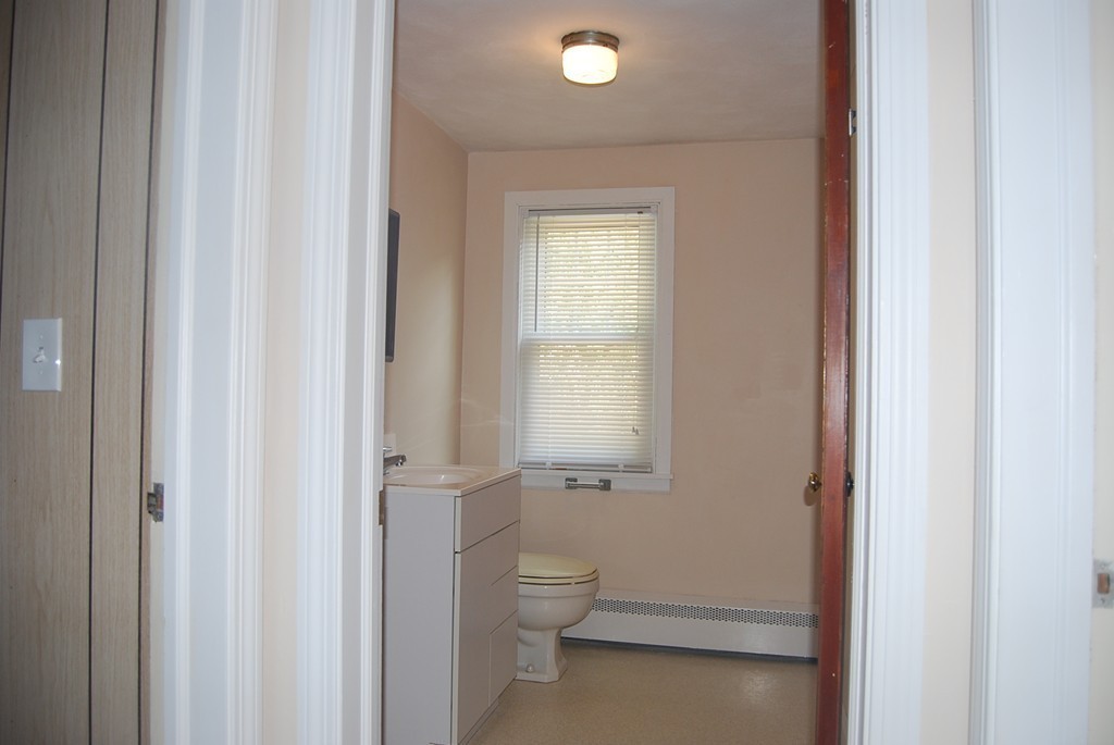 687 Plumtree Road Springfield, MA 01118 - Photo 15 of 27 a bathroom with a granite countertop sink