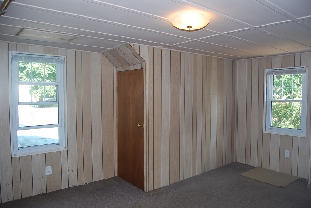 687 Plumtree Road Springfield, MA 01118 - Photo 19 of 27 a view of empty room with windows