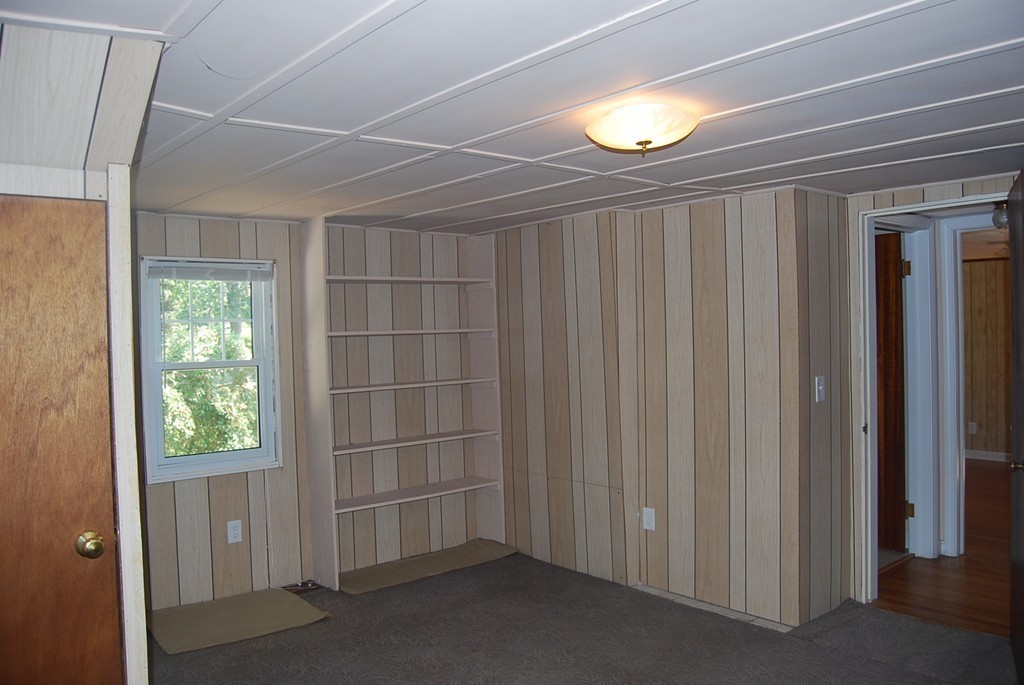687 Plumtree Road Springfield, MA 01118 - Photo 20 of 27 a view of an empty room with a window
