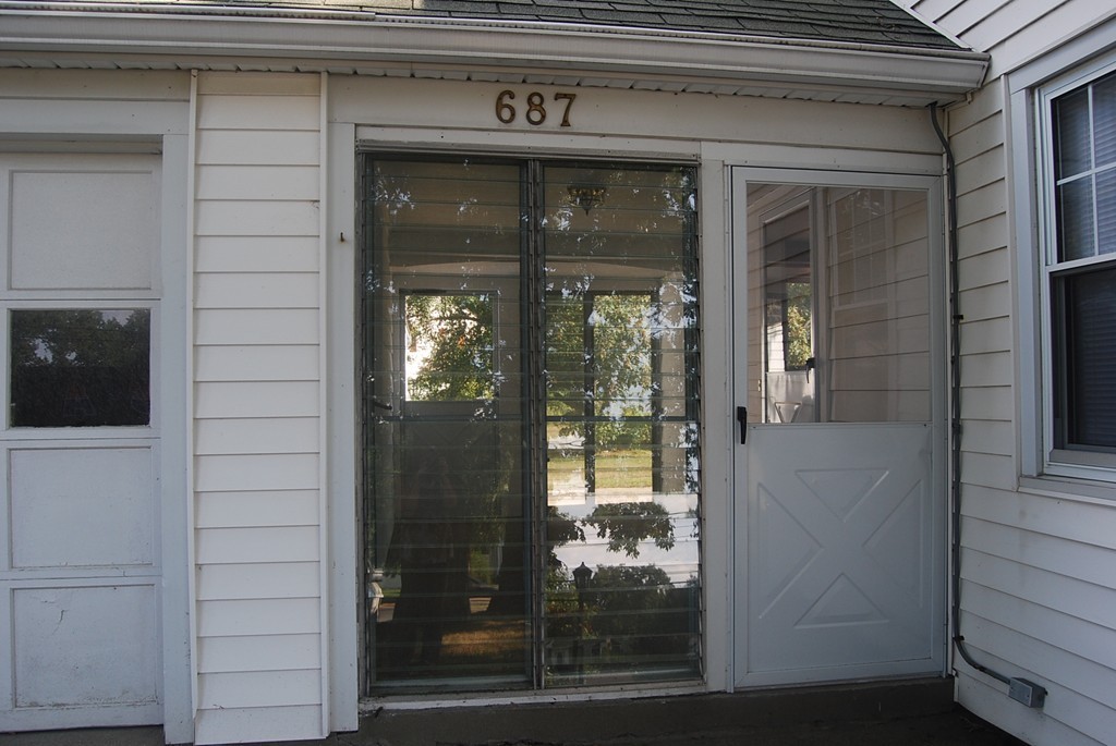 687 Plumtree Road Springfield, MA 01118 - Photo 3 of 27 a view of a door of the house