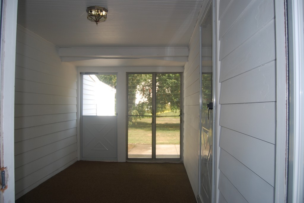 687 Plumtree Road Springfield, MA 01118 - Photo 4 of 27 a view of empty room with windows