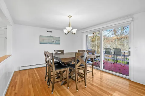 a kitchen with stainless steel appliances granite countertop a stove a microwave and a refrigerator