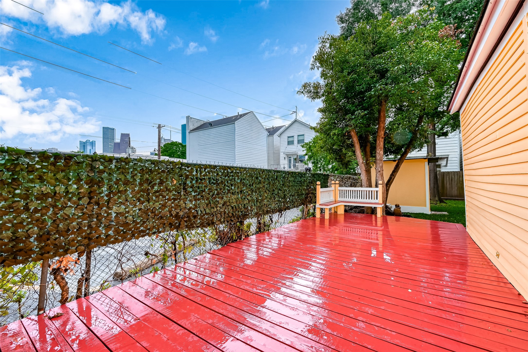 2009 State Street Houston, TX 77007 - Photo 38 of 42 view of side wooded patio on the side of the home