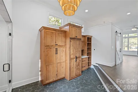 a spacious bathroom with sinks mirror and a shower
