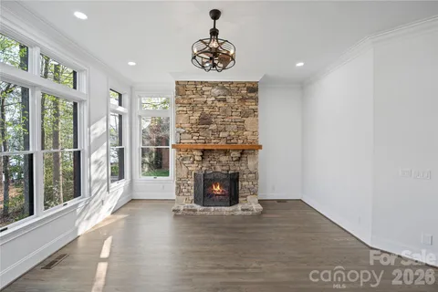 a bathroom with a double vanity sink toilet and shower